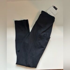Beyond Yoga Strive Pocket Midi Leggings in Black Small